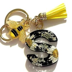 Pressed White Daisy Black Letter S Keychain